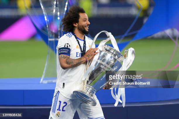 Marcelo of Real Madrid celebrates with the UEFA Champions League Trophy after their sides victory in the UEFA Champions League final match between...