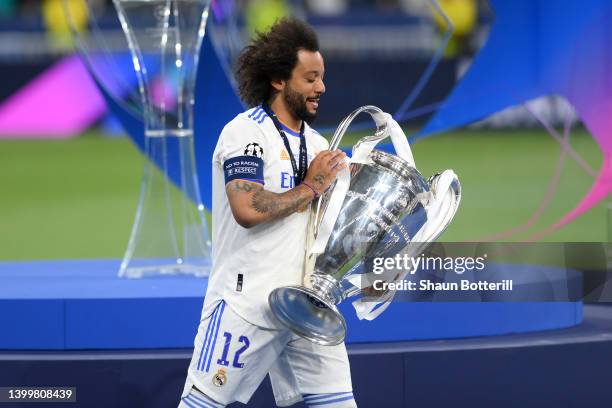 Marcelo of Real Madrid celebrates with the UEFA Champions League Trophy after their sides victory in the UEFA Champions League final match between...