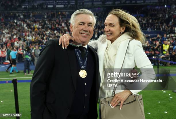 Carlo Ancelotti, Head Coach of Real Madrid celebrates with their wife Mariann Barrena McClay after their sides victory during the UEFA Champions...