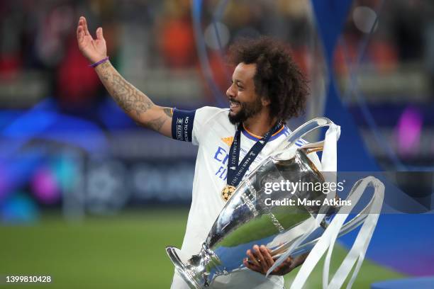 Marcelo of Real Madrid celebrates with the UEFA Champions League trophy following his team's victory in the UEFA Champions League final match between...