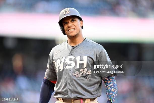 Juan Soto of the Washington Nationals reacts to a called strike in the third inning against the Colorado Rockies during game two of a doubleheader at...