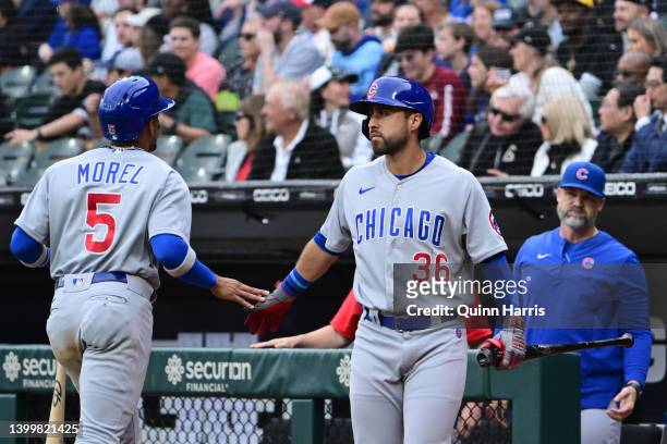 Christopher Morel and Alfonso Rivas of the Chicago Cubs celebrate after Morel scored in the first inning against the Chicago White Sox at Guaranteed...