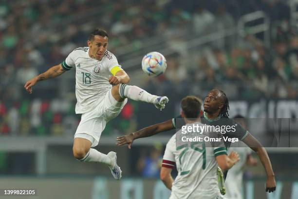 Captain Andrés Guardado of Mexico battle for the ball during the friendly match between Mexico and Nigeria at AT&T Stadium on May 28, 2022 in...