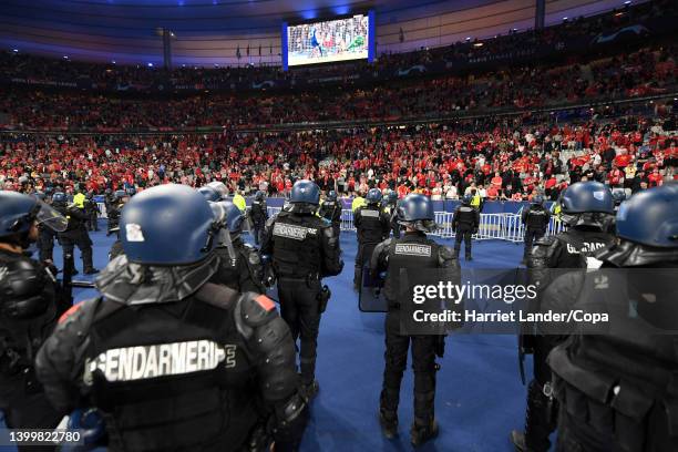 Heavy Police presence is seen in front of the Liverpool fans following the UEFA Champions League final match between Liverpool FC and Real Madrid at...