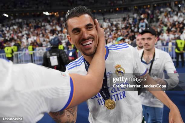 Dani Ceballos of Real Madrid celebrates with a friend following his team's victory in the UEFA Champions League final match between Liverpool FC and...