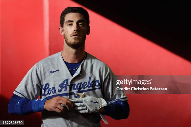 Cody Bellinger of the Los Angeles Dodgers reacts in the dugout after a strike out during the fourth inning of the MLB game against the Arizona...
