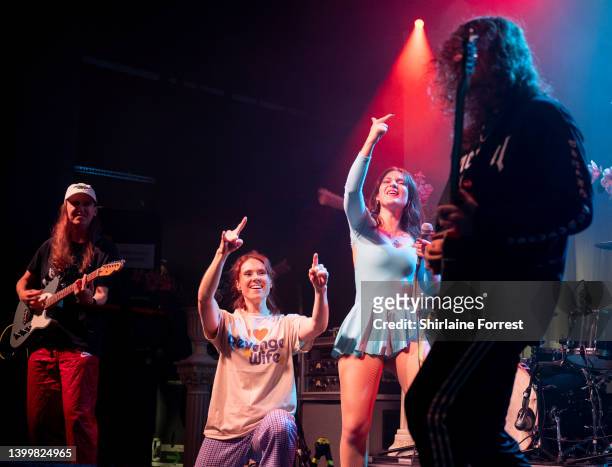 Kate Nash joins Revenge Wife onstage to perform an Oasis cover at Manchester Academy on May 28, 2022 in Manchester, England.