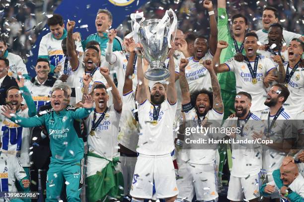 Karim Benzema of Real Madrid lifts UEFA Champions League Trophy following his team's victory in the UEFA Champions League final match between...