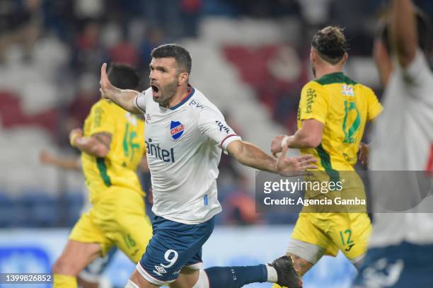 Emmanuel Gigliotti, of Nacional celebrates , after scoring the first goal, during a match between Nacional and Cerrito as part of Primera Division at...