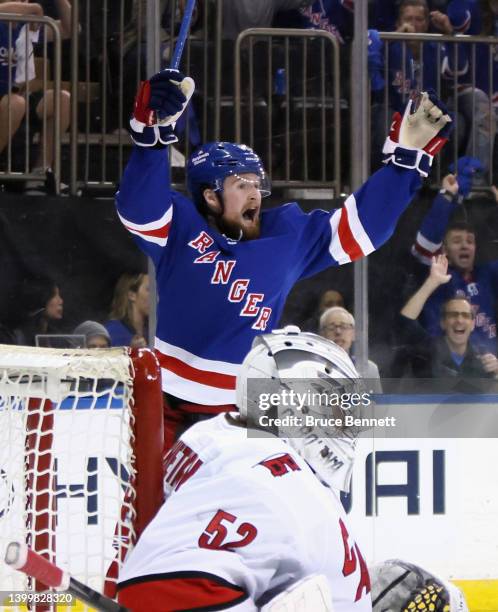 Alexis Lafreniere of the New York Rangers celebrates a goal by v72#2 at 6:47 of the second period against Pyotr Kochetkov of the Carolina Hurricanes...