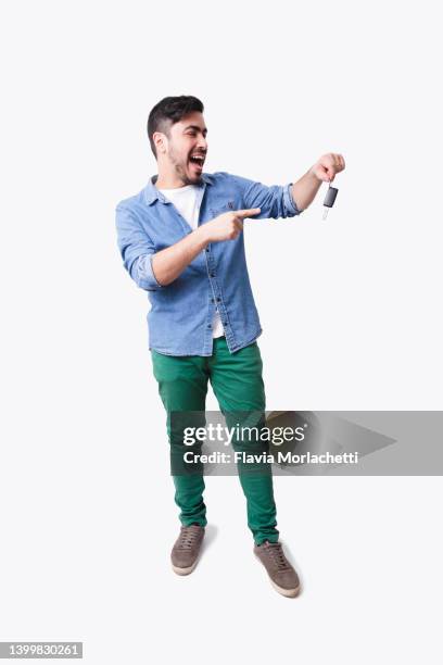 happy man showing car keys - isolated car people stock pictures, royalty-free photos & images