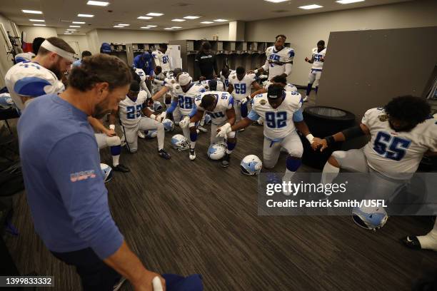 Head coach Larry Fedora of the New Orleans Breakers takes a moment with the team in the locker room before the game against the Michigan Panthers at...