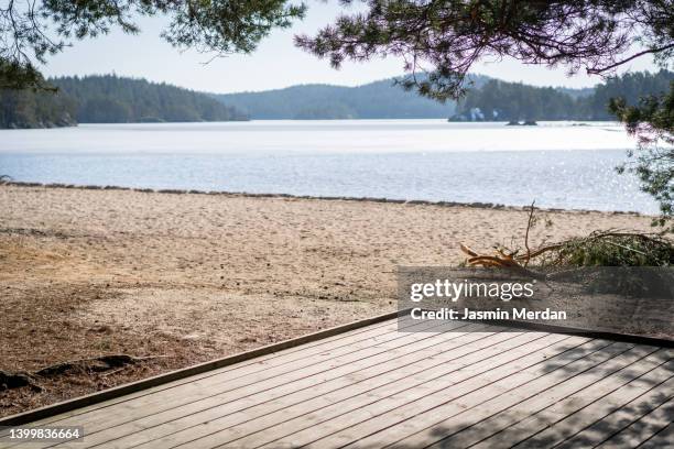 patio on lake - parking deck stock pictures, royalty-free photos & images