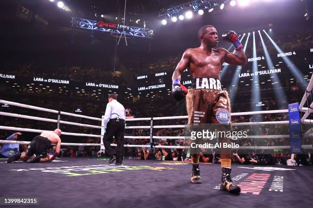 Erislandy Lara knocks down Gary O'Sullivan during their fight for Lara's WBA World middleweight title at Barclays Center on May 28, 2022 in Brooklyn,...