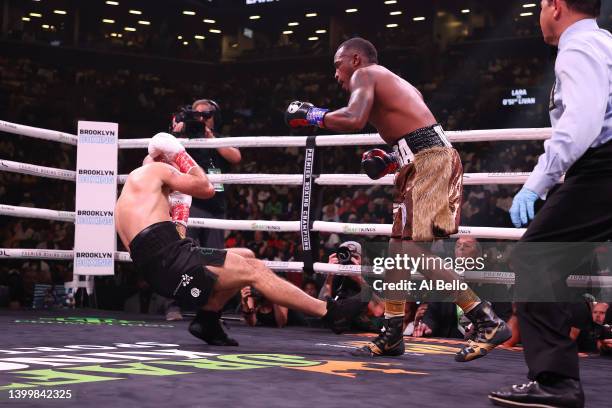 Erislandy Lara knocks down Gary O'Sullivan during their fight for Lara's WBA World middleweight title at Barclays Center on May 28, 2022 in Brooklyn,...