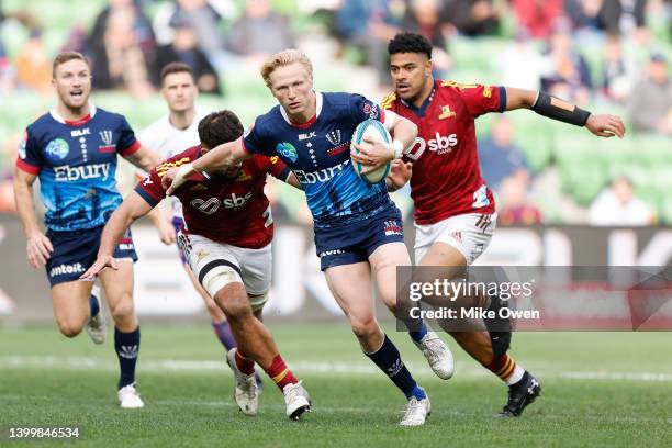 Carter Gordon of the Rebels runs with the ball during the round 15 Super Rugby Pacific match between the Melbourne Rebels and the Highlanders at AAMI...