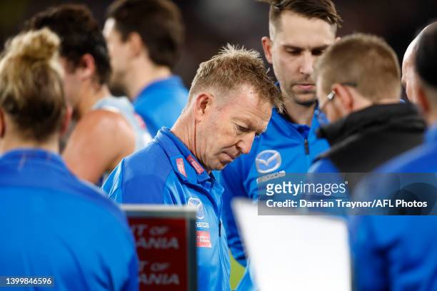 David Noble, Senior coach of the Kangaroos is seen at the 3/4 time huddle during the round 11 AFL match between the St Kilda Saints and the North...