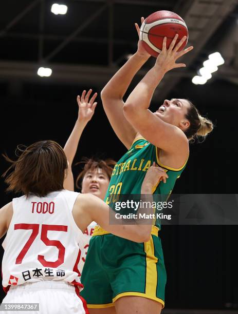 Lauren Scherf of the Opals is challenged by Nanako Todo of Japan during game two of the International Women's series between Australian Opals and...