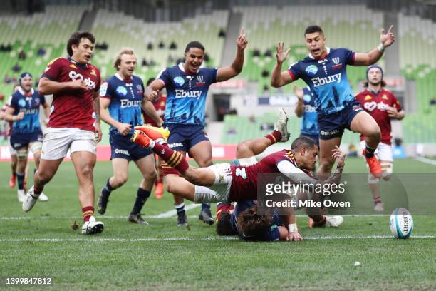 Nick Jooste of the Rebels scores a try during the round 15 Super Rugby Pacific match between the Melbourne Rebels and the Highlanders at AAMI Park on...