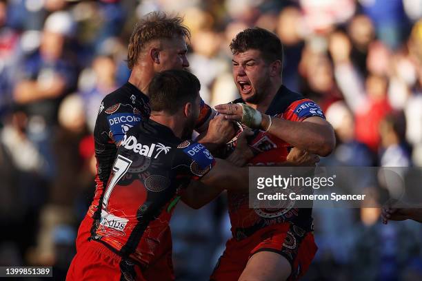 Blake Lawrie of the Dragons celebrates scoring a try during the round 12 NRL match between the Canterbury Bulldogs and the St George Illawarra...