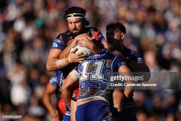 Aaron Woods of the Dragons is tackled during the round 12 NRL match between the Canterbury Bulldogs and the St George Illawarra Dragons at Belmore...