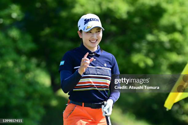 Sakura Koiwai of Japan acknowledges the gallery after winning the tournament on the 18th green during the final round of Resorttrust Ladies at Maple...