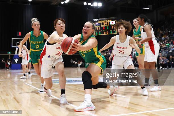 Tess Madgen of the Opals is challenged by Aika Hirashita of Japan during game two of the International Women's series between Australian Opals and...