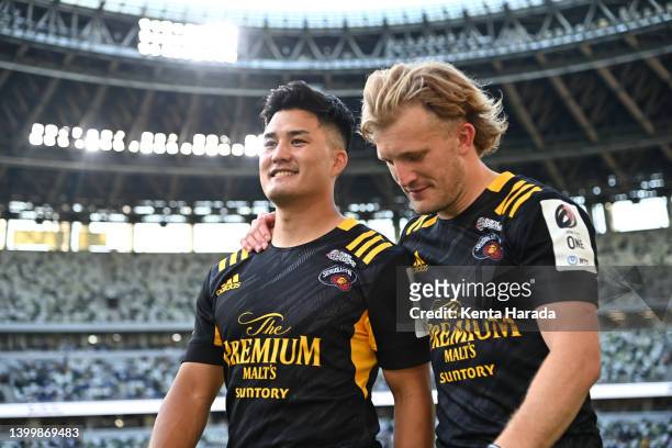 Hikaru Tamura and Damian McKenzie of the Tokyo Suntory Sungoliath are seen after the NTT Japan Rugby League One Play Off final between Tokyo Suntory...