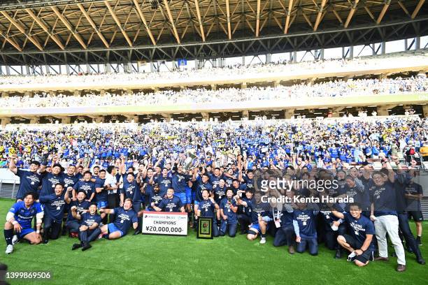 Saitama Panasonic Wild Knights players and staffs celebrate their victory with supporters after the NTT Japan Rugby League One Play Off final between...