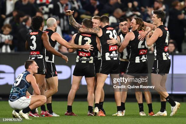 The Magpies celebrate winning the round 11 AFL match between the Collingwood Magpies and the Carlton Blues at Melbourne Cricket Ground on May 29,...