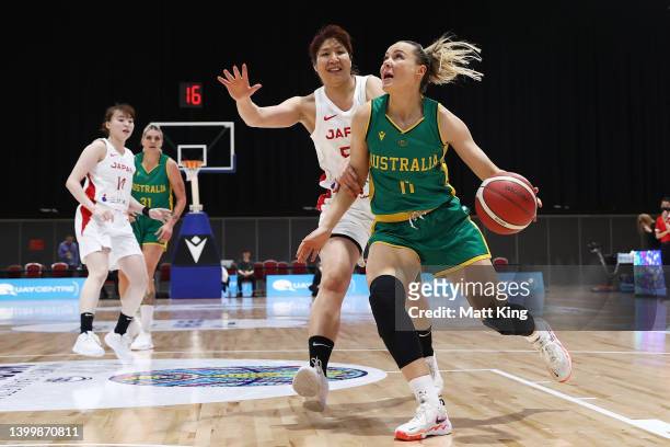 Tess Madgen of the Opals is challenged by Yuki Myazawa of Japan during game two of the International Women's series between Australian Opals and...