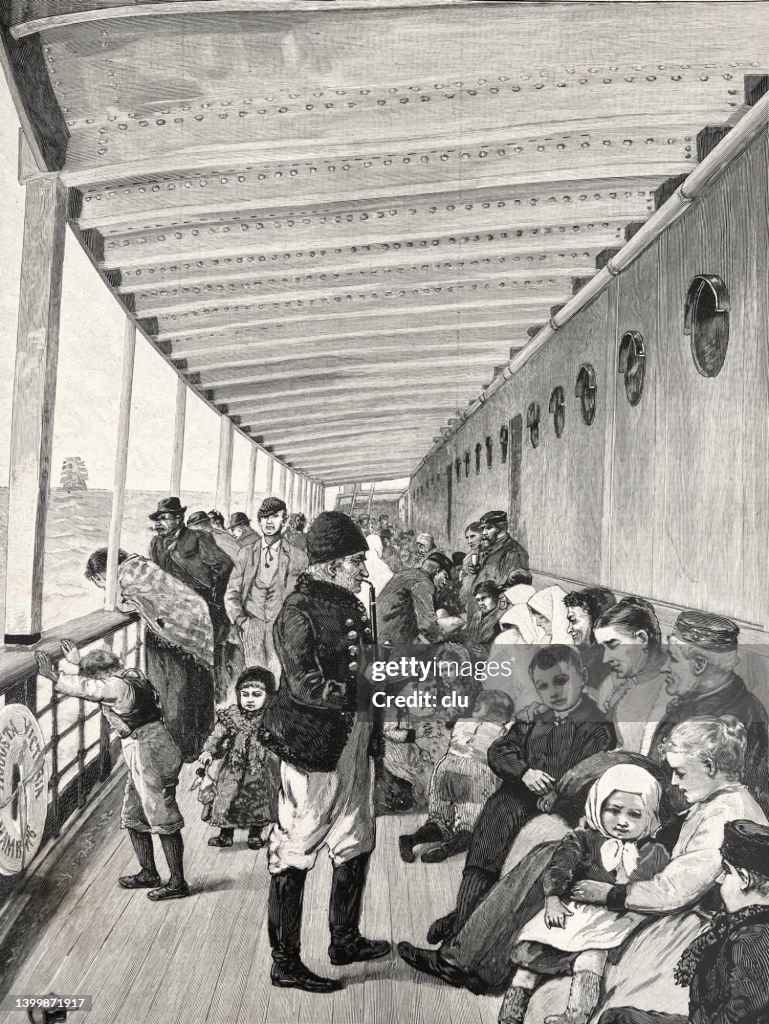 On deck of an ocean steamer, people sitting and standing