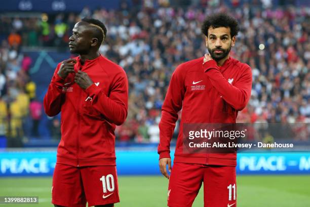Mohamed Salah and Sadio Mane of Liverpool line up ahead of the UEFA Champions League final match between Liverpool FC and Real Madrid at Stade de...
