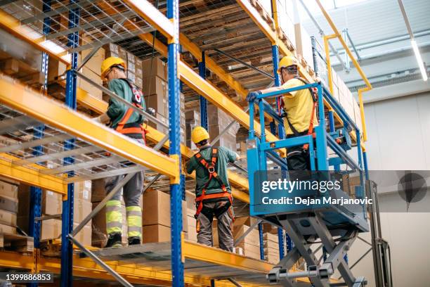 warehouse rack assembly - top of cardboard box stock pictures, royalty-free photos & images