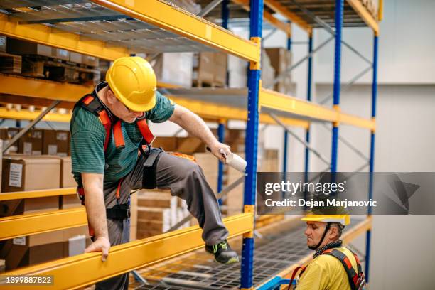 warehouse rack assembly - top of cardboard box stock pictures, royalty-free photos & images