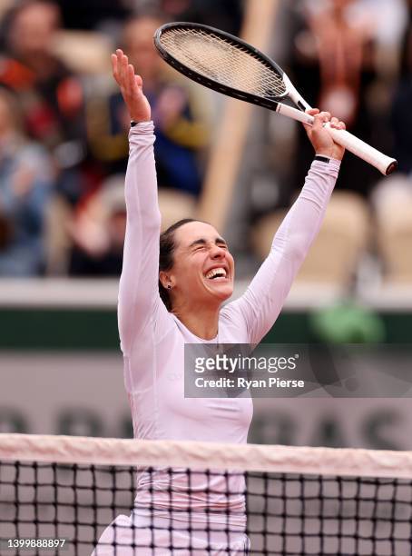 Martina Trevisan of Italy celebrates after winning match point against Aliaksandra Sasnovich during the Women's Singles Fourth Round match on Day 8...