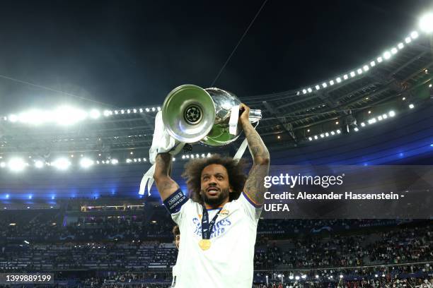 Marcelo of Real Madrid lifts the UEFA Champions League trophy after their sides victory during the UEFA Champions League final match between...