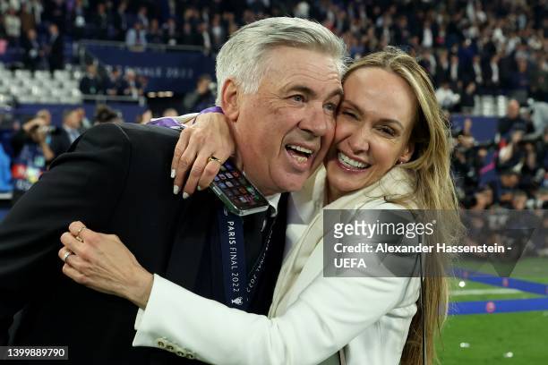 Carlo Ancelotti, Head Coach of Real Madrid celebrates with their wife Mariann Barrena McClay after their sides victory during the UEFA Champions...