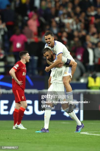 Karim Benzema and Dani Ceballos of Real Madrid celebrate after their sides victory during the UEFA Champions League final match between Liverpool FC...