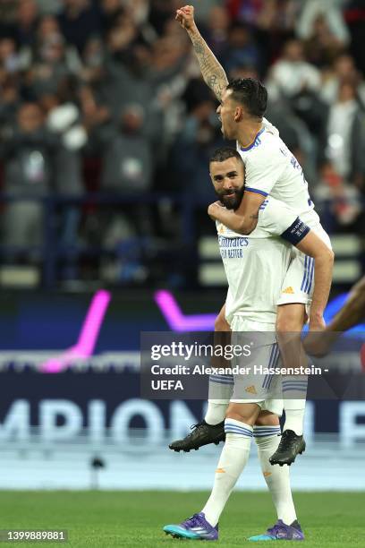 Karim Benzema and Dani Ceballos of Real Madrid celebrate after their sides victory during the UEFA Champions League final match between Liverpool FC...