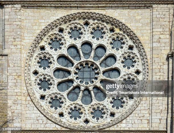 majestic close up view of the rose window of the cathedral of chartres in loire valley, france - tracery stock pictures, royalty-free photos & images