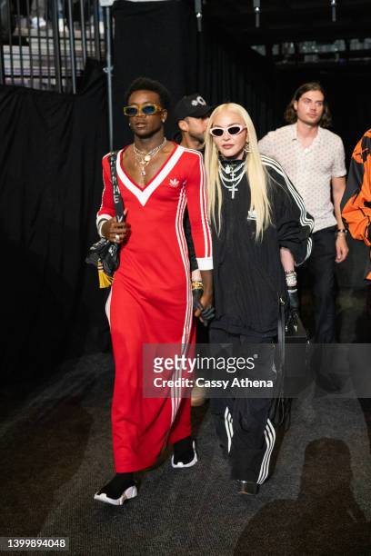 David Banda and Madonna attend the WBA World Lightweight Championship title bout between Gervonta Davis and Rolando Romero at the Barclays Center in...