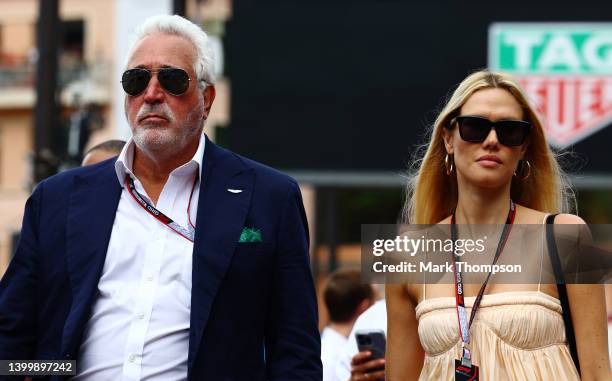 Owner of Aston Martin F1 Team Lawrence Stroll walks with Raquel Diniz in the Paddock ahead of the F1 Grand Prix of Monaco at Circuit de Monaco on May...