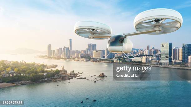 evtol traffic in the skies - 車　無人 ストックフォトと画像