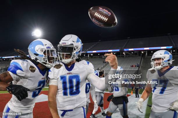 Quarterback Kyle Sloter of the New Orleans Breakers celebrates after scoring the game-winning touchdown with teammate Adonis Alexander in overtime...