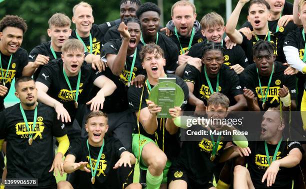 Silas Ostrzinski , goalkeeper of Borussia Dortmund U19 lifts the trophy after the A Junior German Championship Final between Hertha BSC U19 and...