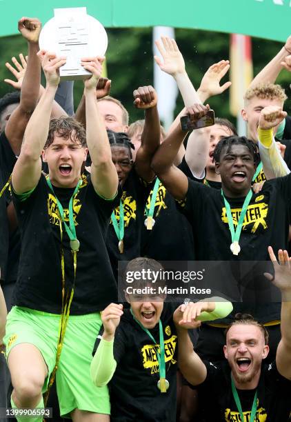 Silas Ostrzinski , goalkeeper of Borussia Dortmund U19 lifts the trophy after the A Junior German Championship Final between Hertha BSC U19 and...