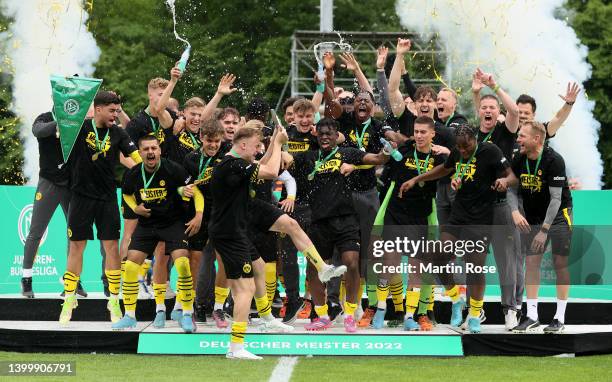 Dennis Lütke Fries , of Borussia Dortmund U19 lifts the trophy after the A Junior German Championship Final between Hertha BSC U19 and Dorussia...