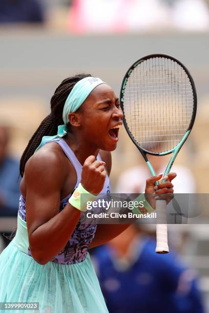 Coco Gauff of The United States celebrates after winning match point against Elise Mertens of Belgium during the Women's Singles Fourth Round match...