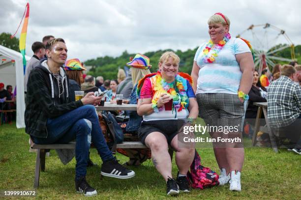 People take part in the Durham Pride Festival on May 29, 2022 in Durham, England. The parade made its way through the streets of the city centre...